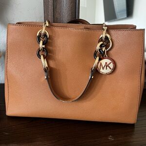 Camel colored Michael Kors Handbag with Tortoise Shell straps, great condition
